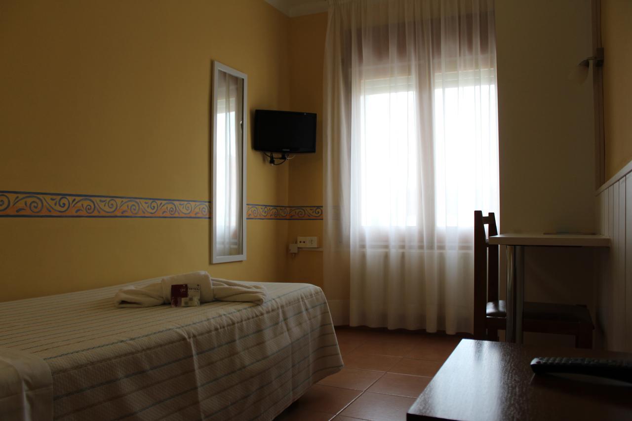Hostal Fabrellas Caldes de Malavella Rom bilde
